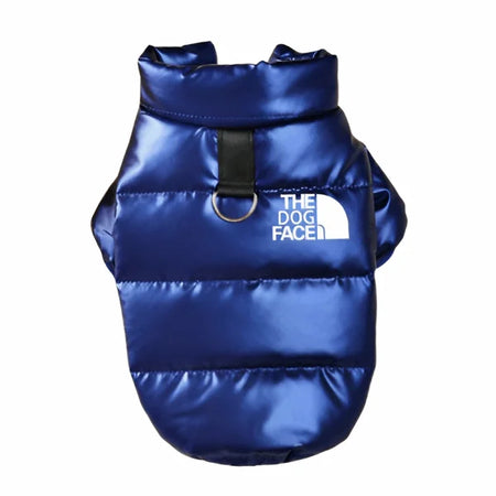 Blue puffer dog vest with 'The Dog Face' logo on a white background