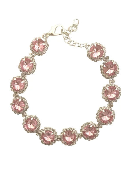 Jewelry bracelet with pink gemstones on a white background
