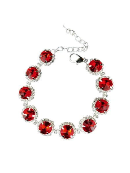 Bracelet with red gemstones on a white background