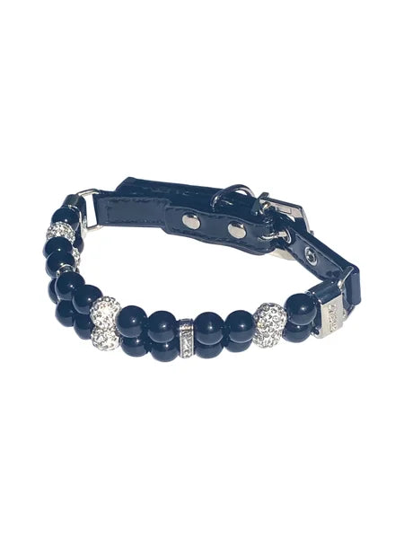 Navy blue beaded bracelet with silver accents on a white background