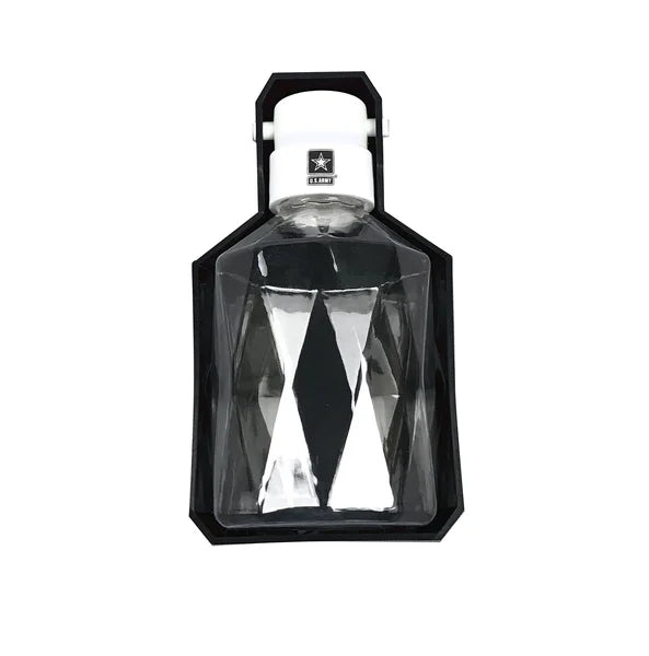 Clear glass bottle with black diamond pattern in a hexagonal box on a white background