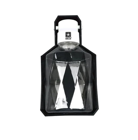 Clear glass bottle with black diamond pattern in a hexagonal box on a white background