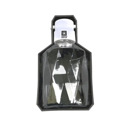 Clear glass bottle with black cap on a white background