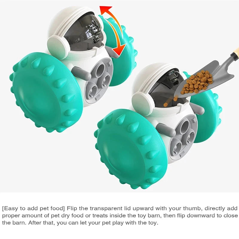 Two teal and gray Interactive Dog Treat Dispenser & Slow Feeder - Tumbler Toy for Small to Large Dogs with transparent lids and spiky wheels are shown. An arrow indicates lifting the lids to add dry pet food or treats with a gray scoop. Text below provides instructions on adding food and closing the lids, then letting pets play with these interactive dog treat dispensers.