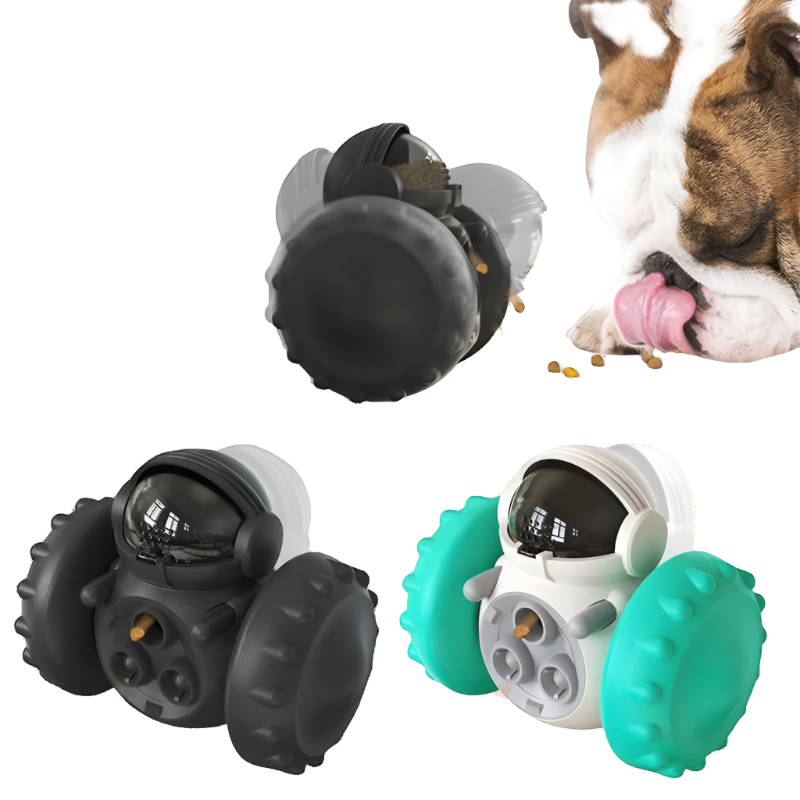 A cat and a dog are examining pet toy dispensers that release food pellets. Three Interactive Dog Treat Dispenser & Slow Feeder - Tumbler Toy for Small to Large Dogs are shown at the bottom: one in black and green, another in black and gray, and the last in white and green. The dispensers have round wheels, a transparent top with pellet release mechanisms for mental stimulation.